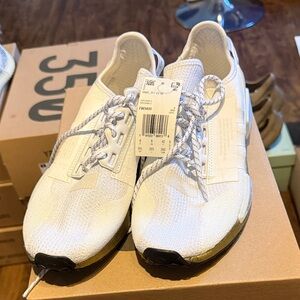 Adidas Men's White/Gold Athletic Shoes with Black Soles